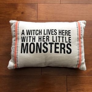 Decorative throw pillow- 15” x 10”.